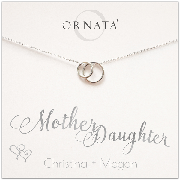 Mother Daughter necklace - personalized silver necklaces. Our sterling silver custom jewelry is a perfect gift for mothers and daughters, wives, or family members. Also a good gift for Mother’s Day or a gift for daughters to give their mothers. Delicate sterling silver interlocking rings represent a mother and daughter.