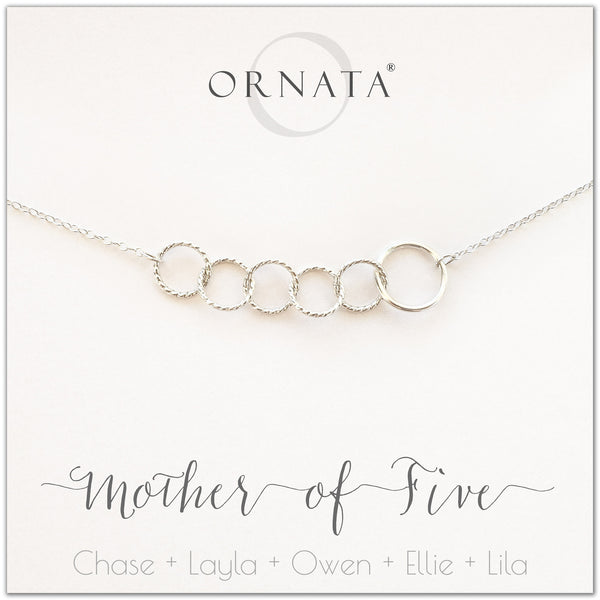 Mom or Mother of Five - personalized silver necklaces. Our sterling silver custom jewelry is a perfect gift for mothers of five children, wives, or family members. Also a good gift for Mother’s Day. Delicate sterling silver interlocking rings represent a mother and her five children.