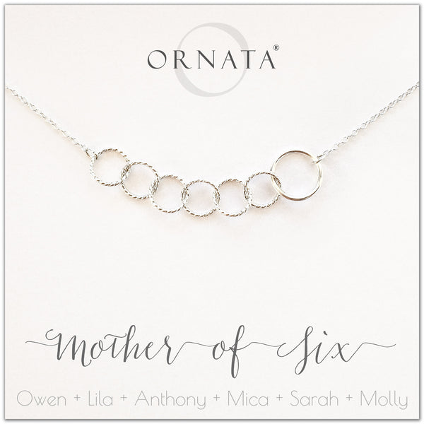 Mom or Mother of Six - personalized silver necklaces. Our sterling silver custom jewelry is a perfect gift for mothers of six children, wives, or family members. Also a good gift for Mother’s Day. Delicate sterling silver interlocking rings represent a mother and her six children.