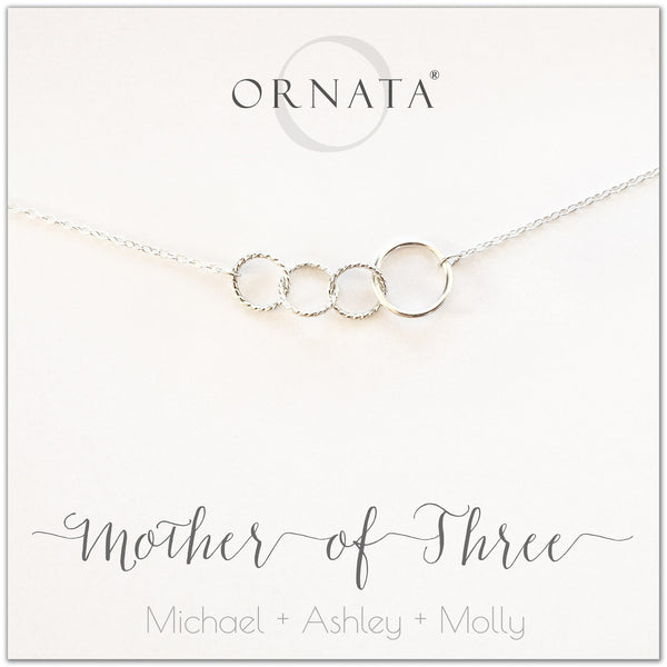 Mom or Mother of Three - personalized silver necklaces. Our sterling silver custom jewelry is a perfect gift for mothers of three children, wives, or family members. Also a good gift for Mother’s Day. Delicate sterling silver interlocking rings represent a mother and her three children.