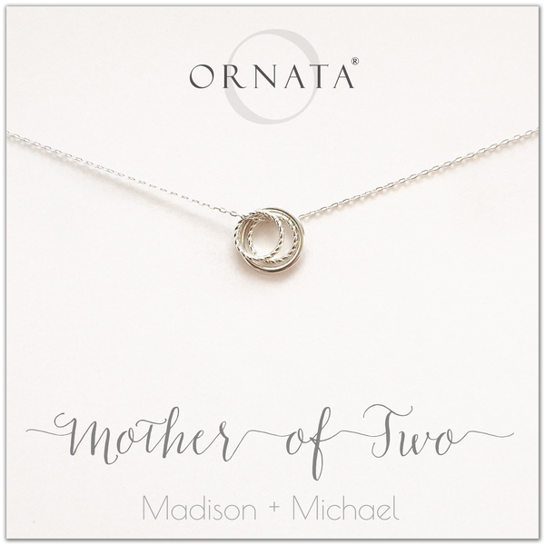 Mom or Mother of Two - personalized silver necklaces. Our sterling silver custom jewelry is a perfect gift for mothers of two children, daughters, granddaughters, grandmothers, sisters, best friends, wives, girlfriends, and family members. Also a good gift for Mother’s Day. Delicate sterling silver rings represent a mother and her two children.