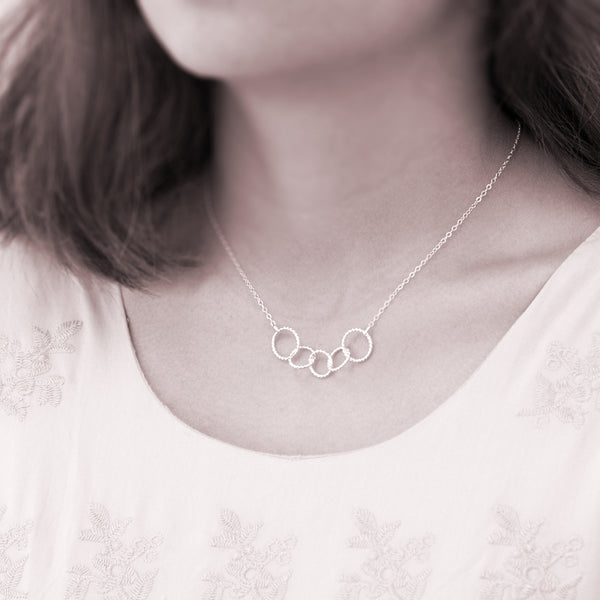 Family of 5 necklace - personalized family necklace is sterling silver with 5 interlocking rings to represent five family members. Great custom Mother’s Day gift.