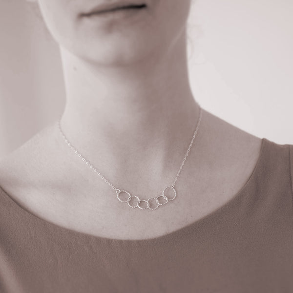 Family of 6 necklace - personalized family necklace is sterling silver with 6 interlocking rings to represent six family members. Great custom Mother’s Day gift.