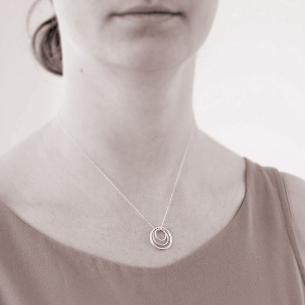 Custom generations necklace - 3 ring necklace - personalized jewelry is sterling silver and the custom necklaces are perfect gifts for a mother, daughter, granddaughter, grandmother, or family member. Good Mother’s Day Gift.