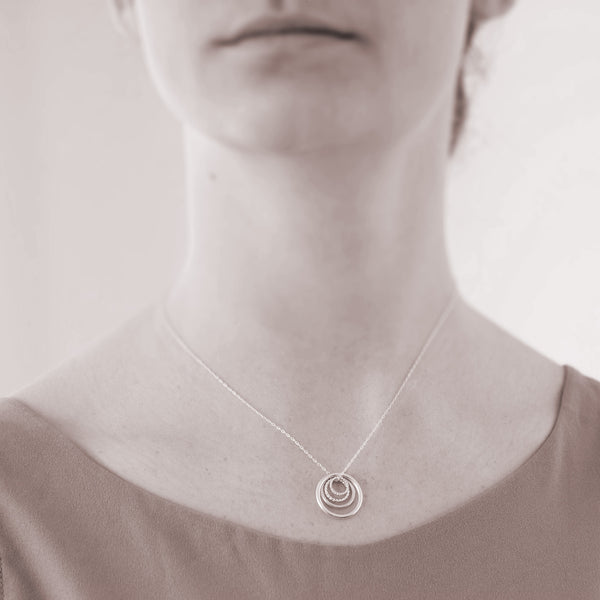 Custom generations necklace - 4 ring necklace - personalized jewelry is sterling silver and the custom necklaces are perfect gifts for a mother, daughter, granddaughter, grandmother, or family member. Good Mother’s Day Gift.