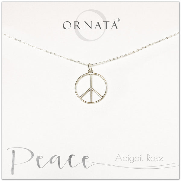 Peace necklace - personalized silver peace sign necklace. Our sterling silver custom jewelry is a perfect gift to symbolize peace with a delicate peace symbol charm.