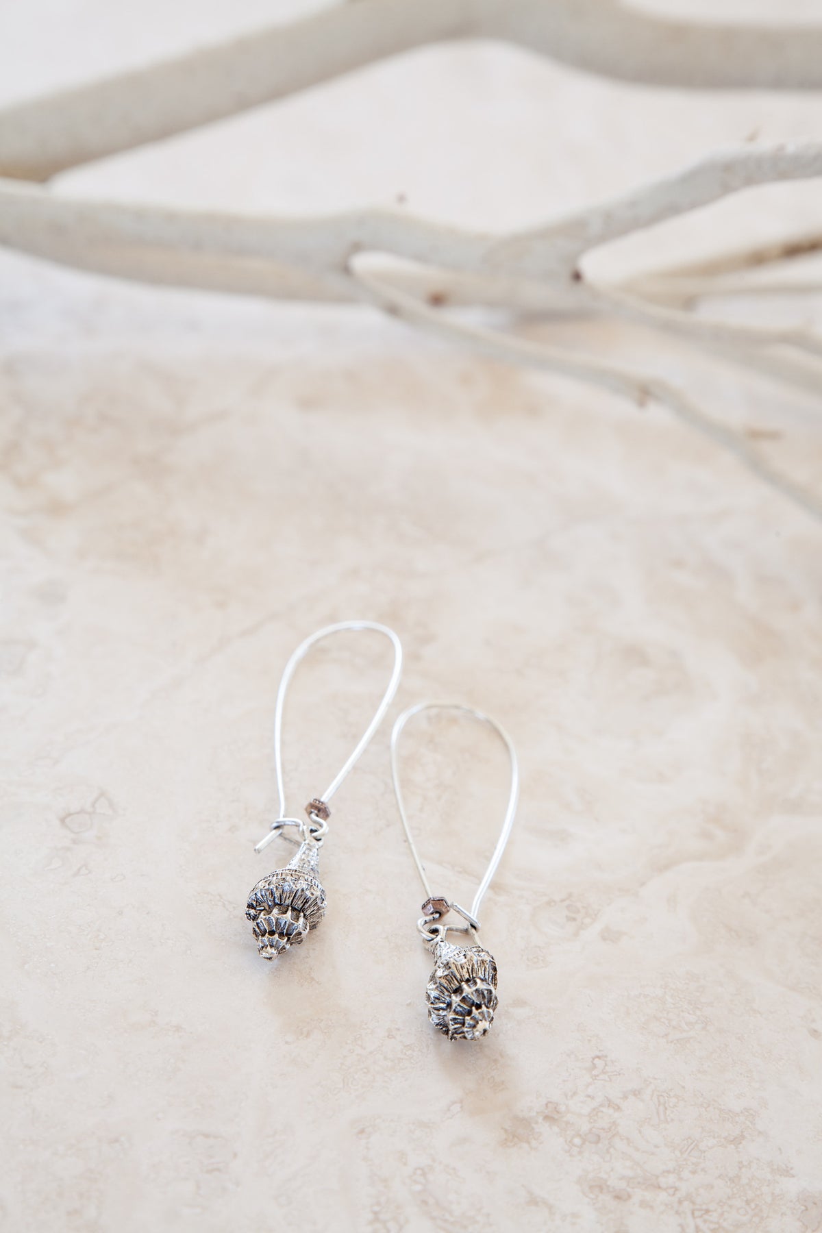 Silver Plated Trumpet Shell Earrings