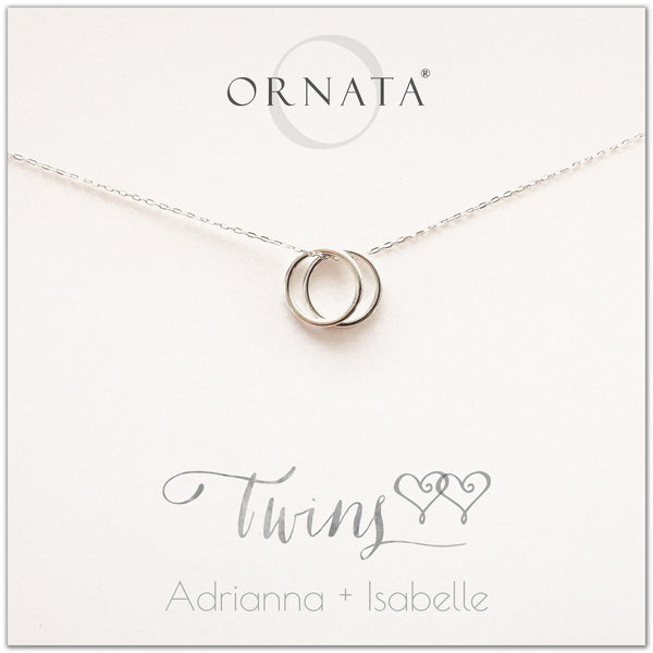 Personalized twins necklace. Our sterling silver custom jewelry is a perfect gift for best friends, sisters, BFFs, moms, and mothers of twins - symbolic necklace to represent twin sisters with two silver interlocking rings. Good gift for best friend or sister or mom of twins.