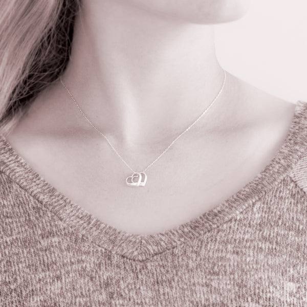 Custom necklace with two hearts one soul - personalized jewelry is sterling silver and is a good symbolic gift for girlfriend, best friend, sister, or soul mate. Also great wedding present, engagement present, bridal shower present, or wedding shower present for newlyweds.