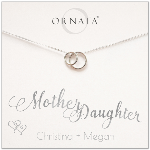 Mother Daughter necklace - personalized silver necklaces. Our sterling silver custom jewelry is a perfect gift for mothers and daughters, wives, or family members. Also a good gift for Mother’s Day or a gift for daughters to give their mothers. Delicate sterling silver interlocking rings represent a mother and daughter. 
