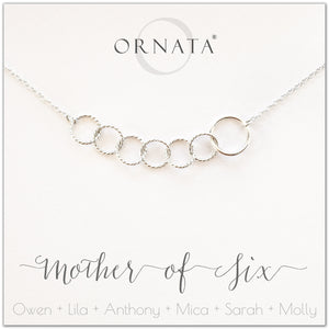 Mom or Mother of Six - personalized silver necklaces. Our sterling silver custom jewelry is a perfect gift for mothers of six children, wives, or family members. Also a good gift for Mother’s Day. Delicate sterling silver interlocking rings represent a mother and her six children. 