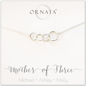 Mom or Mother of Three - personalized silver necklaces. Our sterling silver custom jewelry is a perfect gift for mothers of three children, wives, or family members. Also a good gift for Mother’s Day. Delicate sterling silver interlocking rings represent a mother and her three children. 