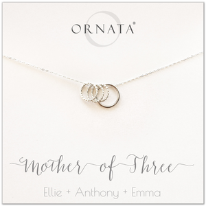 Mom or Mother of Three - personalized silver necklaces. Our sterling silver custom jewelry is a perfect gift for mothers of three children, wives, or family members. Also a good gift for Mother’s Day. Delicate sterling silver rings represent a mother and her three children. 