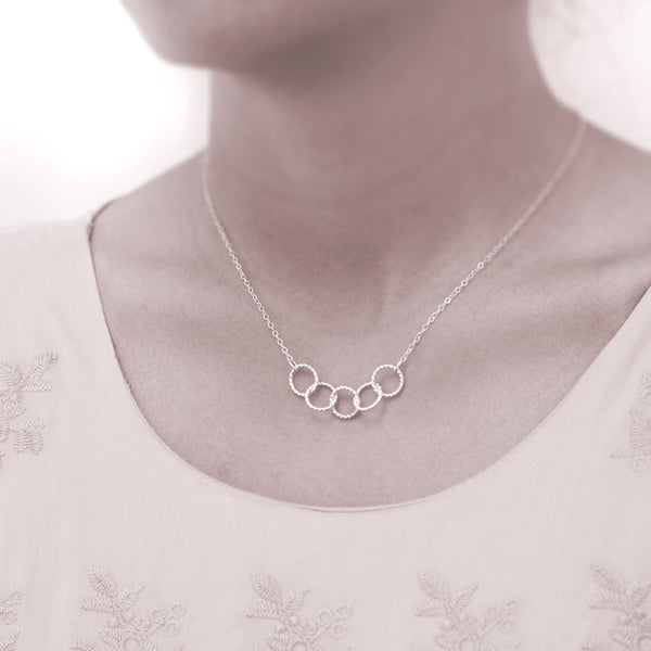 Custom 5 best friends necklace - personalized jewelry is sterling silver and the custom friendship necklaces are good gifts for best friends or sisters. Represents five best friends with 5 sterling silver interlocking rings.  