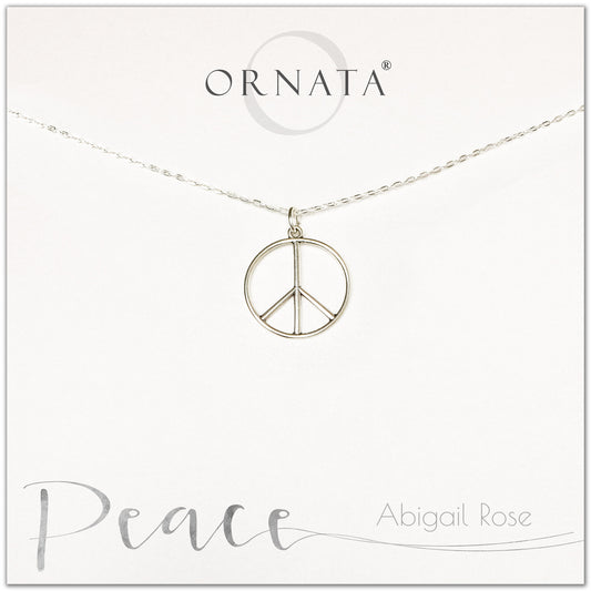 Peace necklace - personalized silver peace sign necklace. Our sterling silver custom jewelry is a perfect gift to symbolize peace with a delicate peace symbol charm. 