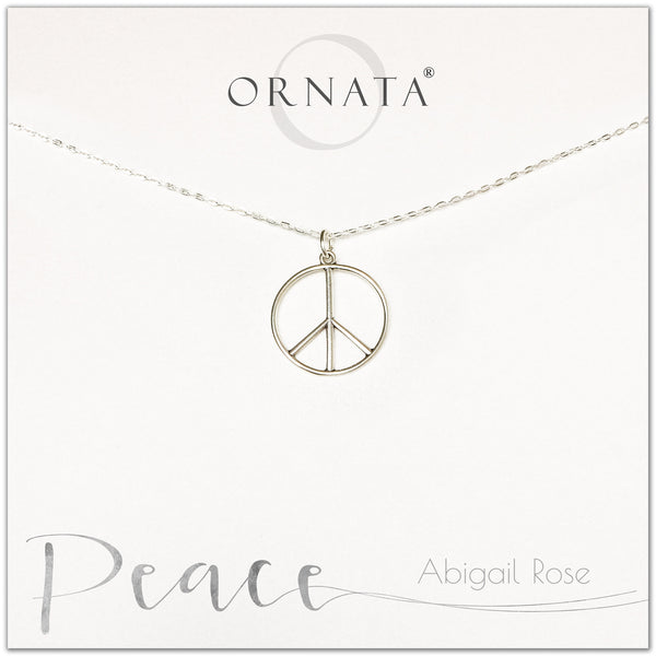 Peace necklace - personalized silver peace sign necklace. Our sterling silver custom jewelry is a perfect gift to symbolize peace with a delicate peace symbol charm. 