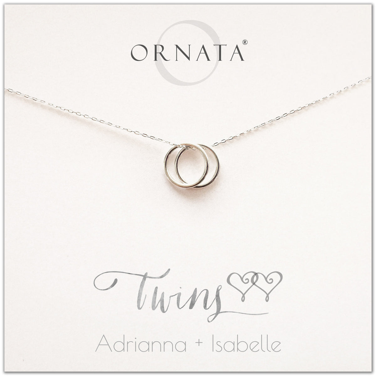 Personalized twins necklace. Our sterling silver custom jewelry is a perfect gift for best friends, sisters, BFFs, moms, and mothers of twins - symbolic necklace to represent twin sisters with two silver interlocking rings. Good gift for best friend or sister or mom of twins. 